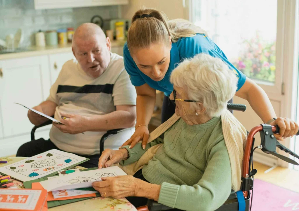Caregiver assisting senior experiencing memory challenges