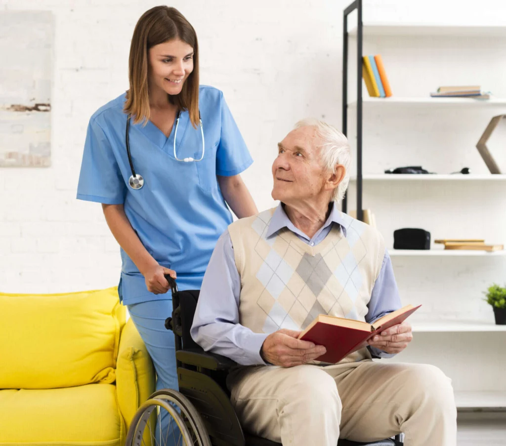 Senior receiving assistance while using wheelchair